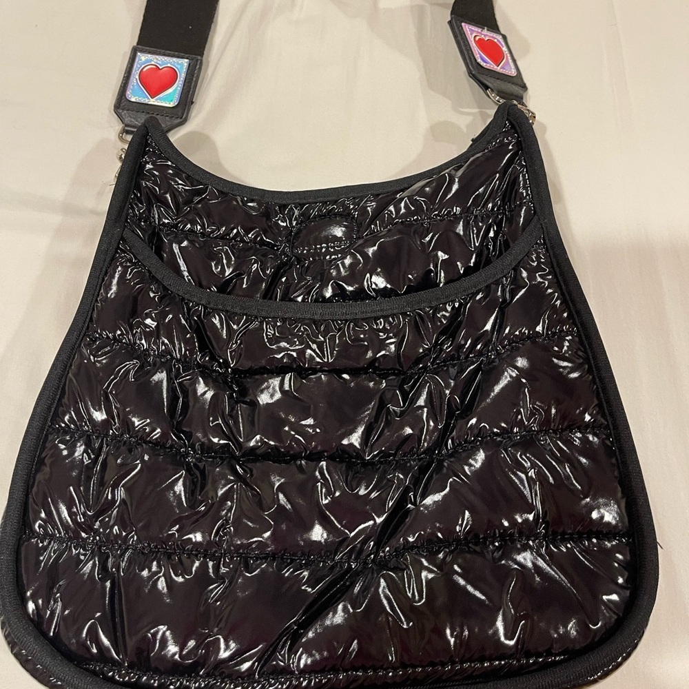 Ah-dorned shiny puffer bag with adorable heart adjustable strap‎